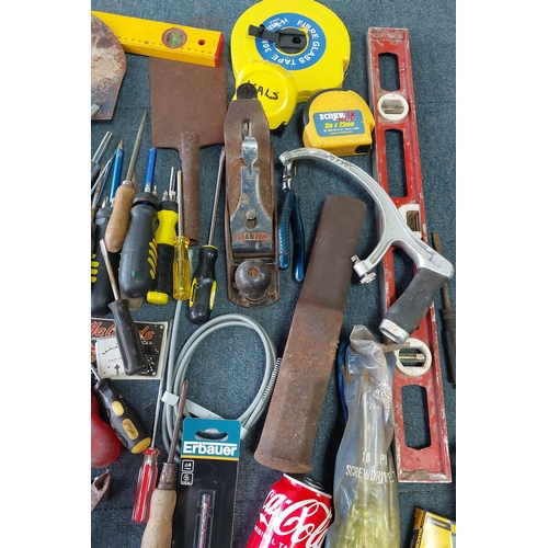 13 - An assortment of workshop tools and hardware, including a Stanley bench plane, hand saw, spirit leve... 