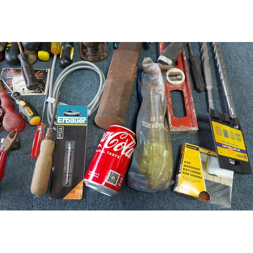 13 - An assortment of workshop tools and hardware, including a Stanley bench plane, hand saw, spirit leve... 