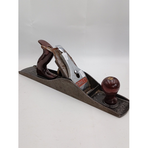 25 - A pair of metal-bodied bench planes comprising a Stanley example and a Record example, each with jap... 