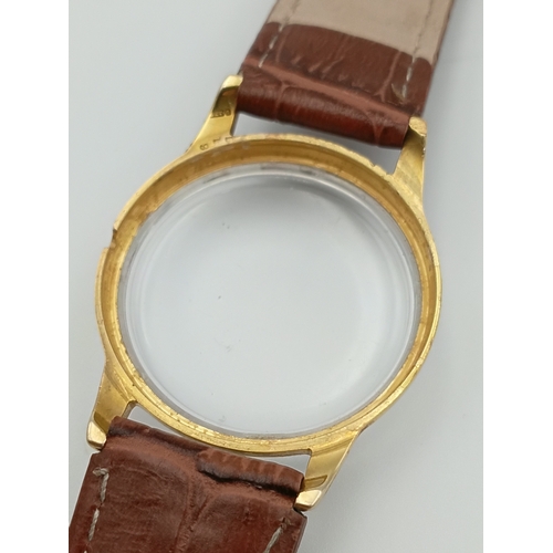 479 - A 9ct gold tudor manual wind wrist watch. Working. Dennison case. stamped rolex. Apx 10g gold.