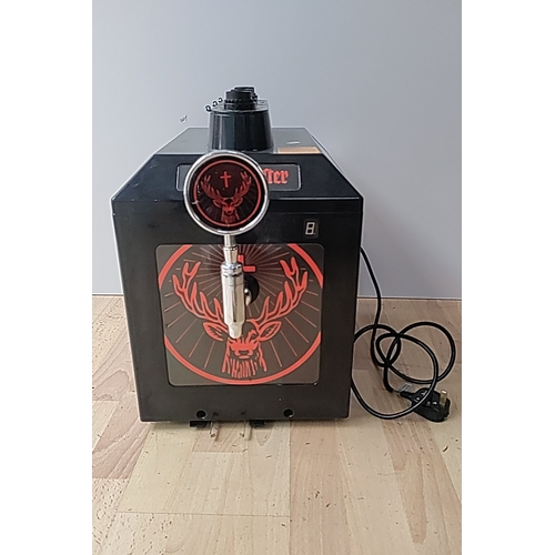Jägermeister branded countertop draught dispenser in black metal, with illuminated stag-head tap badge, front-mounted chrome spout, top-mounted control collar, and rear cooling fan, bearing maker’s label and fitted power lead. Turns on and PAT tested. Height 15 inches.