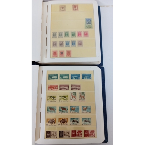 2 Lighthouse albums containing an assortment of early to modern postage stamps from Bulgaria and Albania, duplicated but some useful earlies.
