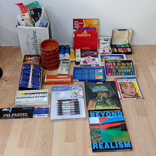 A quantity of artists’ materials and reference books, including boxed ...