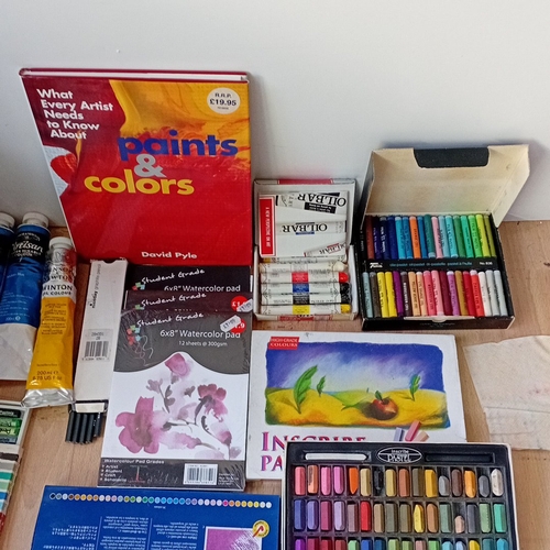 A quantity of artists’ materials and reference books, including boxed ...