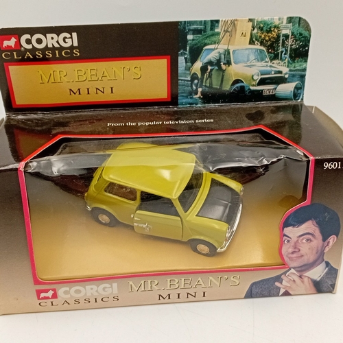 A pair of Corgi Classics ‘Mr Bean’s Mini’ die-cast model cars, with ...