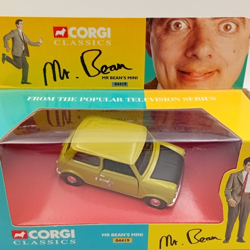 A pair of Corgi Classics ‘Mr Bean’s Mini’ die-cast model cars, with ...