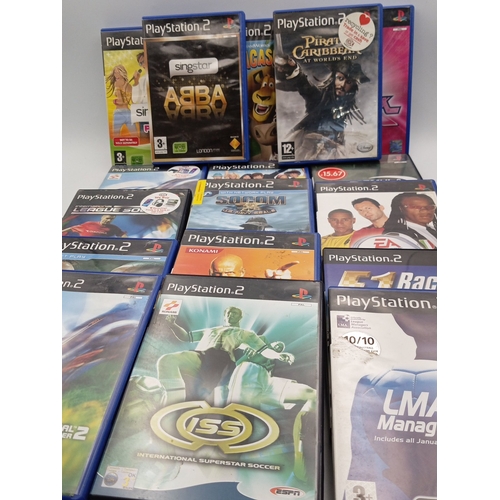 A collection of PAL-format PlayStation 2 games in retail cases ...