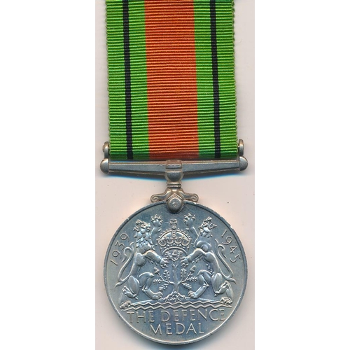 37 - The Defence medal 1939-45. In O.H.M.S Official Paid box addressed to Mr W.H. Hills.