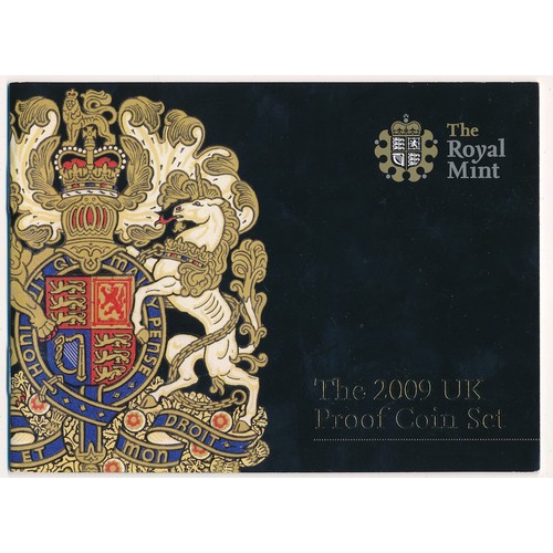 227 - 2009 UK Deluxe proof coin set FDC, including Kew Gardens 50p, black leather edition, issued by The R... 