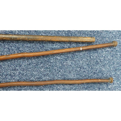 52 - Range of interesting native spears, largest head 42cm long and 13cm wide, 235cm overall length. Head... 