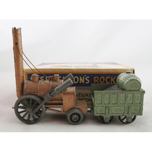 204 - Benbros (Qualitoy). Stephenson's Rocket bronze locomotive and green coal tender, generally good plus... 