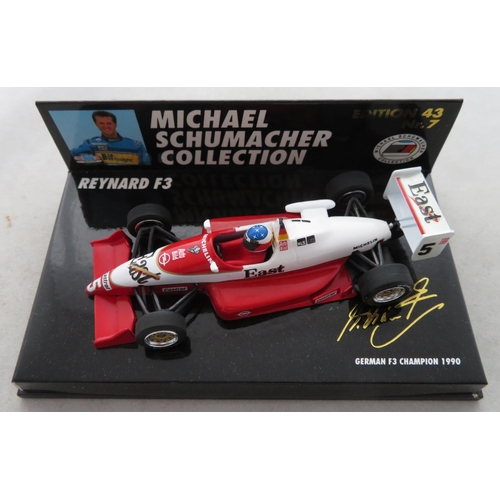 352 - Minichamps. 1/43rd scale Michael Schumacher Collection, generally excellent in excellent plastic dis... 