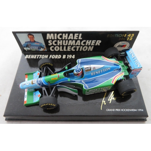 352 - Minichamps. 1/43rd scale Michael Schumacher Collection, generally excellent in excellent plastic dis... 