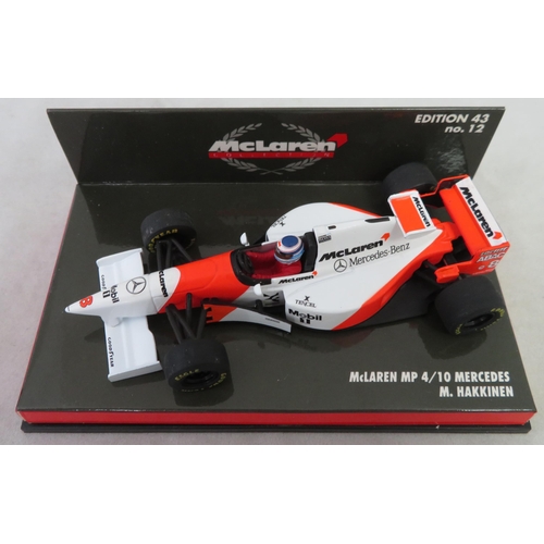 356 - Minichamps. 1/43rd scale McLaren Collection, generally excellent in excellent plastic display cases,... 