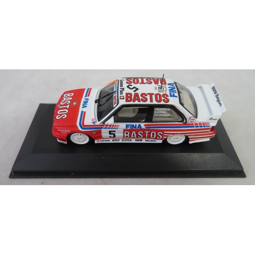 353 - Minichamps. 1/43rd scale Motorsport collection, generally excellent in excellent plastic display cas... 