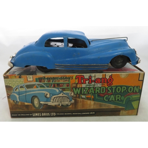 112 - Triang Minic. Pair of Wizard Stop-on Cars clockwork (one with key), generally good (some corrosion a... 