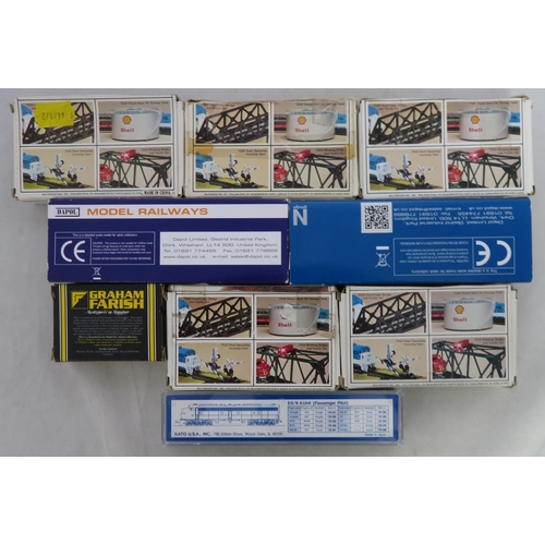 63 - N gauge. Collection of locomotives and wagons, generally excellent in good plus or better boxes/plas... 