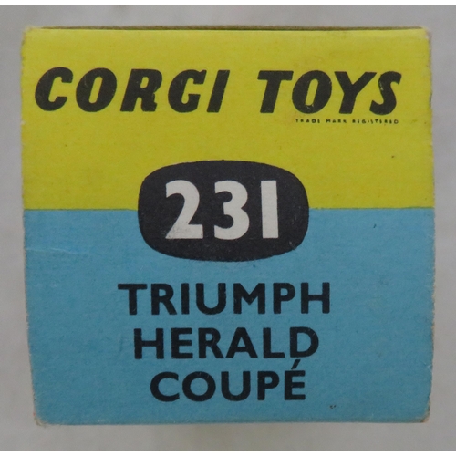 222 - Corgi. Triumph Herald Coupe No. 231, excellent in excellent box, two-tone white and gold, red interi... 