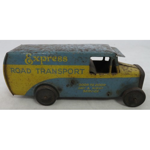 131 - Burnett. Express Road Transport clockwork lorry, good fair (corrosion to body and chassis), non-work... 