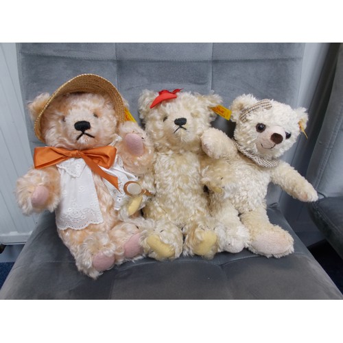 264 - Three Steiff bears with yellow ear tags, one boxed. 645596 Monday, bears of the week series, carryin... 