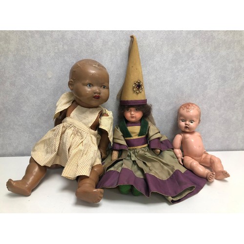 268 - Dolls - three vintage dolls comprising of a composite baby doll probably American 1920s to 1940s app... 