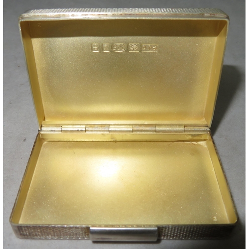 201 - Sterling silver engine turned pill box by Peter John Doherty, London. Monogrammed 