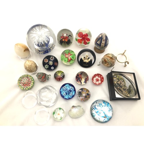 230 - Selection of assorted paperweights and mineral eggs plus stands.