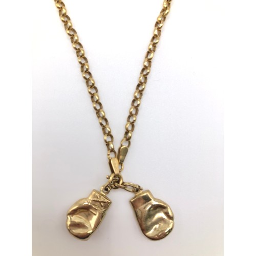 182 - A 9ct gold, pair of boxing gloves pendant on a 9ct gold chain. Weight approx 4.55g.