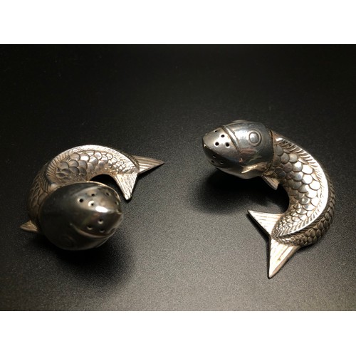 200 - A pair of Norwegian sterling silver fish salt and pepper shakers. Early to mid 20th century with mak... 