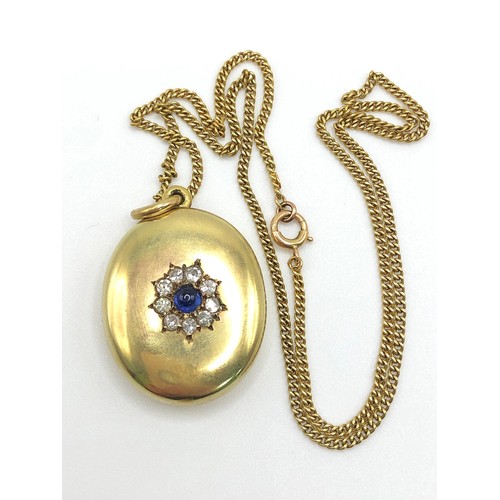 174 - A late 19th Century sapphire and diamond-set locket pendant and chain.
The high-carat gold oval hing... 