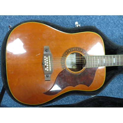 224 - Eko Modello 12-string wooden acoustic guitar, made in Italy. Few scuffs and signs of wear, plus two ... 