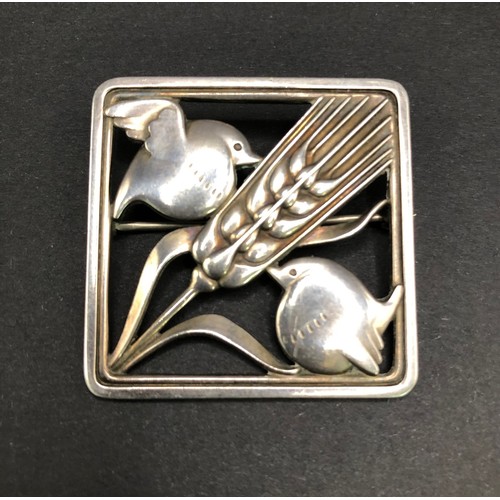 190 - A Georg Jensen sterling silver birds in wheat/ barley brooch.
Design No. 250,  designer Arno Malinow... 