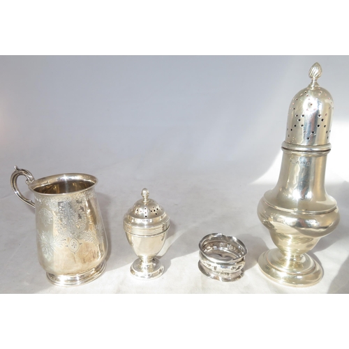 193 - Silver. A range of sterling silver comprising of:
Silver shaker by Levi and Salaman, Birmingham 1904... 