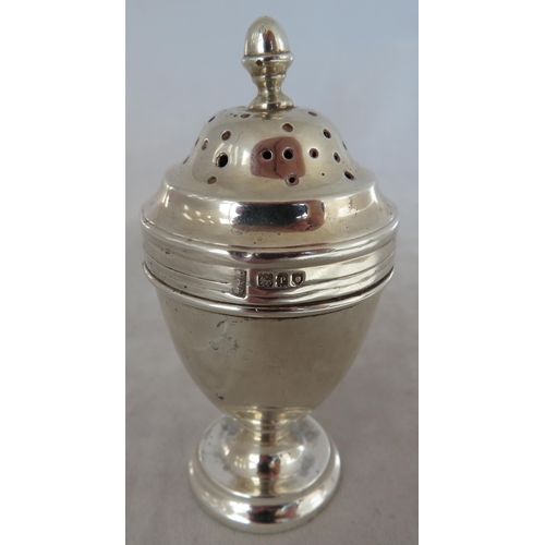 193 - Silver. A range of sterling silver comprising of:
Silver shaker by Levi and Salaman, Birmingham 1904... 