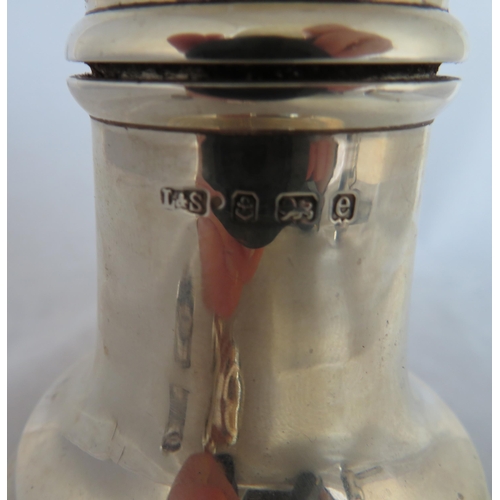 193 - Silver. A range of sterling silver comprising of:
Silver shaker by Levi and Salaman, Birmingham 1904... 