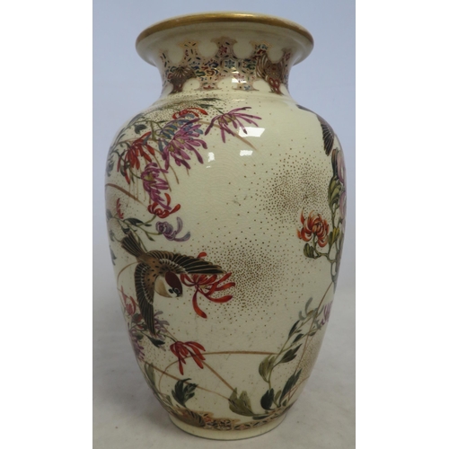 273 - A Japanese satsuma vase decorated with flowers and birds, approx 23cm high.