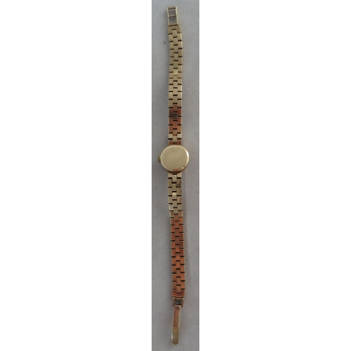 157 - Watch - A Swiss made 9ct gold Marvin ladies watch on a 9ct gold bracelet. Stamped N&TLtd and fully h... 