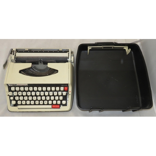 243 - A Brother Deluxe 850TR portable typewriter in hard case. Used condition.