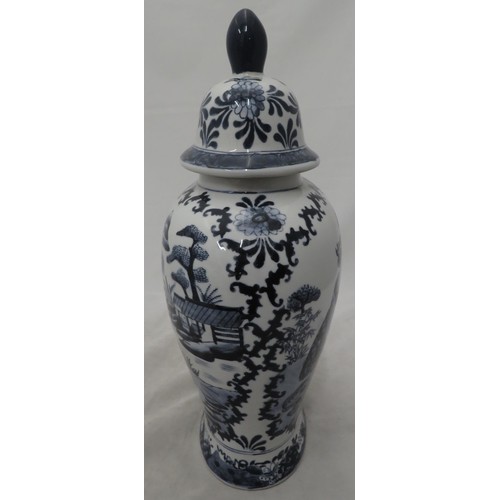 270 - Large oriental blue and white vase depicting two women and a child in a garden setting.
Approx 38cm ... 