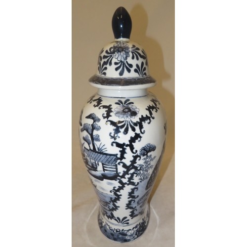 270 - Large oriental blue and white vase depicting two women and a child in a garden setting.
Approx 38cm ... 