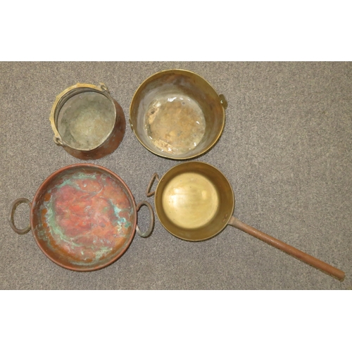 239 - Four brass/copper pans, various sizes, one with long handle.