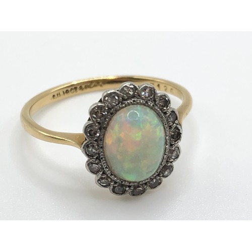 160 - An 18ct gold and platinum opal and diamond cluster ring, size O