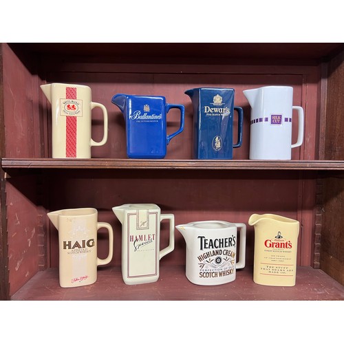 293 - Breweriana. Collection of beer, whisky & tobacco branded pub water jugs (8), including Ballantine's,... 