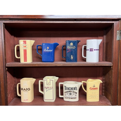 293 - Breweriana. Collection of beer, whisky & tobacco branded pub water jugs (8), including Ballantine's,... 