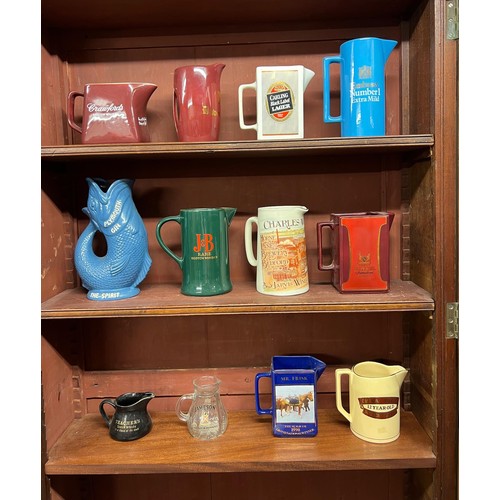 291 - Breweriana. Whisky, beer, gin and tobacco branded pub water jugs (13), including Crawford's, J & B, ... 