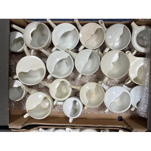 279 - Ceramics. Collection of 64 ceramic invalid feeders with handles, mainly plain design (49, some with ... 