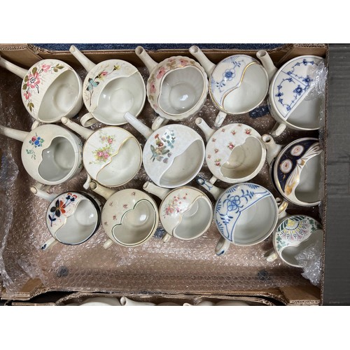 279 - Ceramics. Collection of 64 ceramic invalid feeders with handles, mainly plain design (49, some with ... 