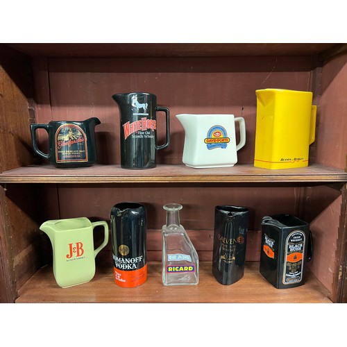 292 - Breweriana. Collection of whisky, beer, tobacco etc branded pub water jugs (9), including J & B, Bal... 