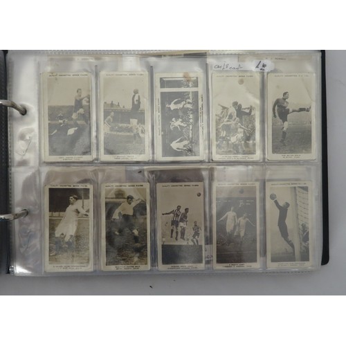 60 - Football cigarette and trade cards in an album, part sets and odds, in mixed condition, with Gallahe... 