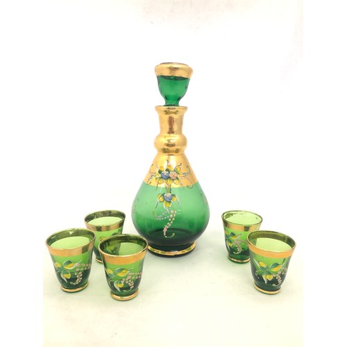 309 - Bohemian Glass – Green decanter with five matching shot glasses. Floral design with gilt finish.